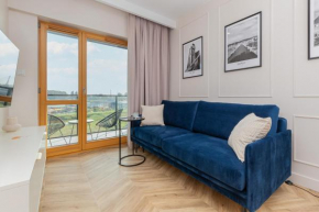 Sienna Grobla Apartment with View of the Motława Terrace & Sauna, Gym by Noclegi Renters